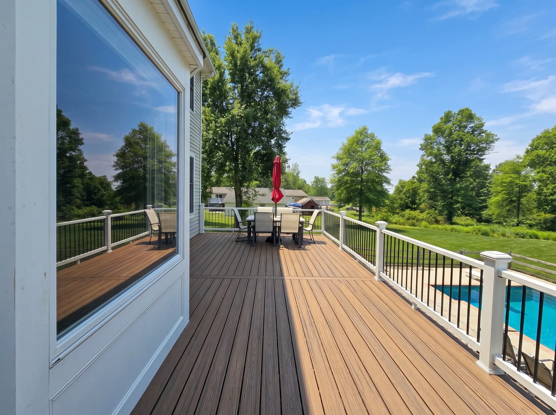 Composite deck overlooking the yard and pool in Doylestown