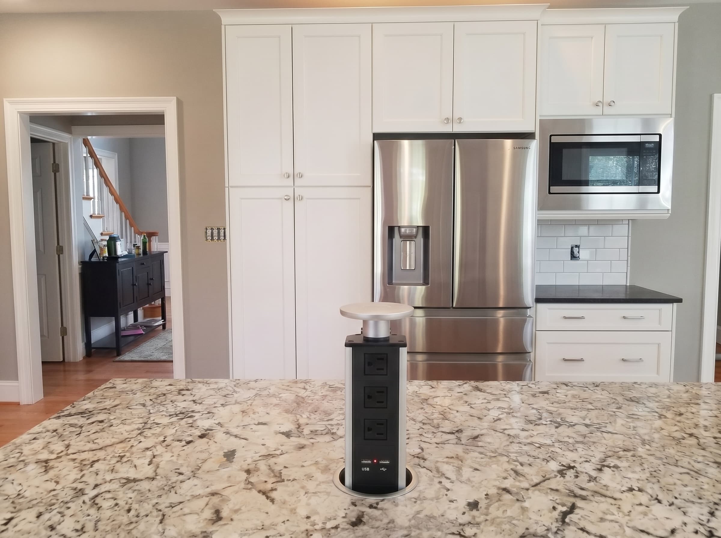 Finished Doylestown kitchen remodel with white cabinetry and a large island