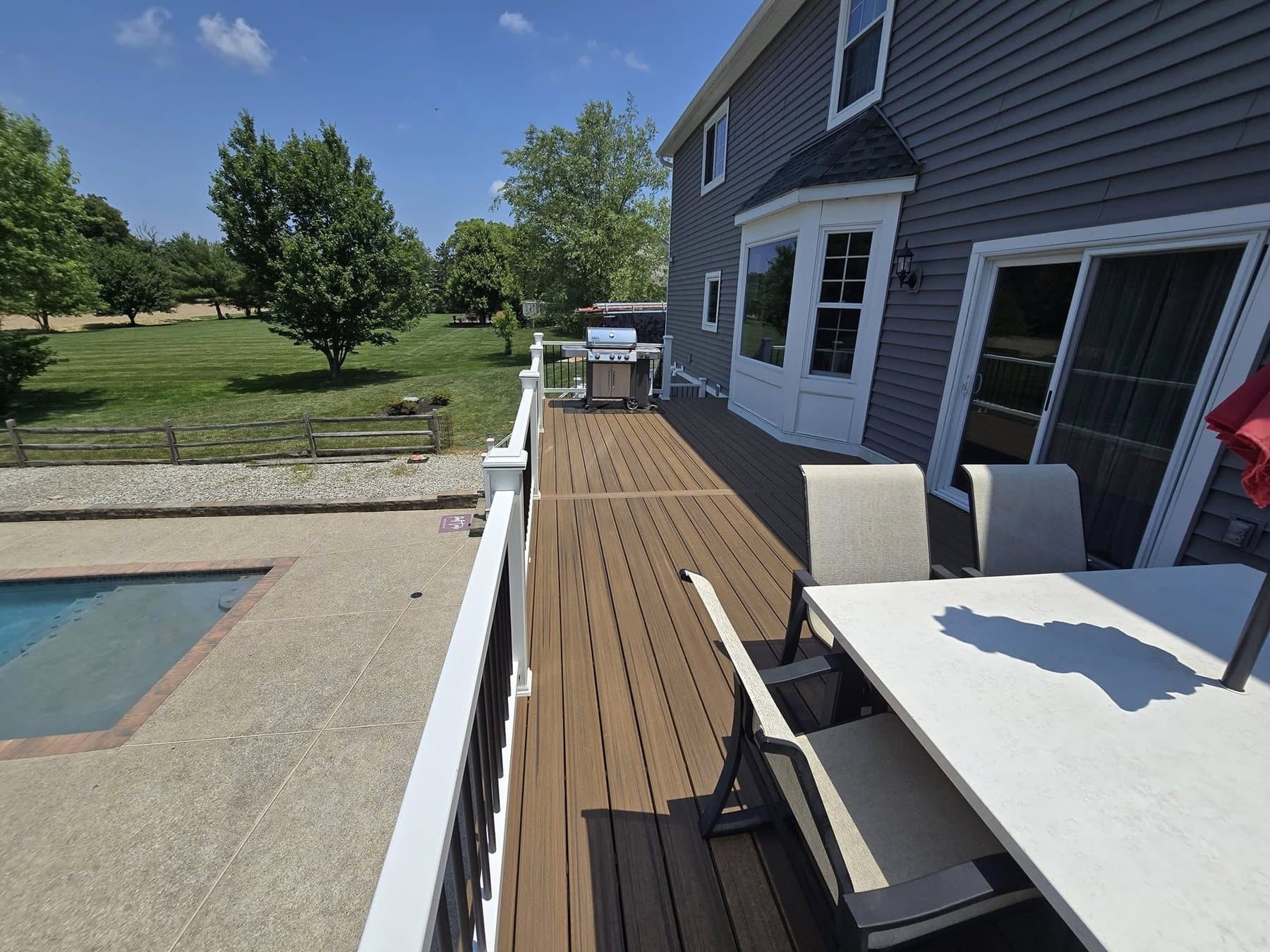 Covered patio and poolside deck project in Doylestown