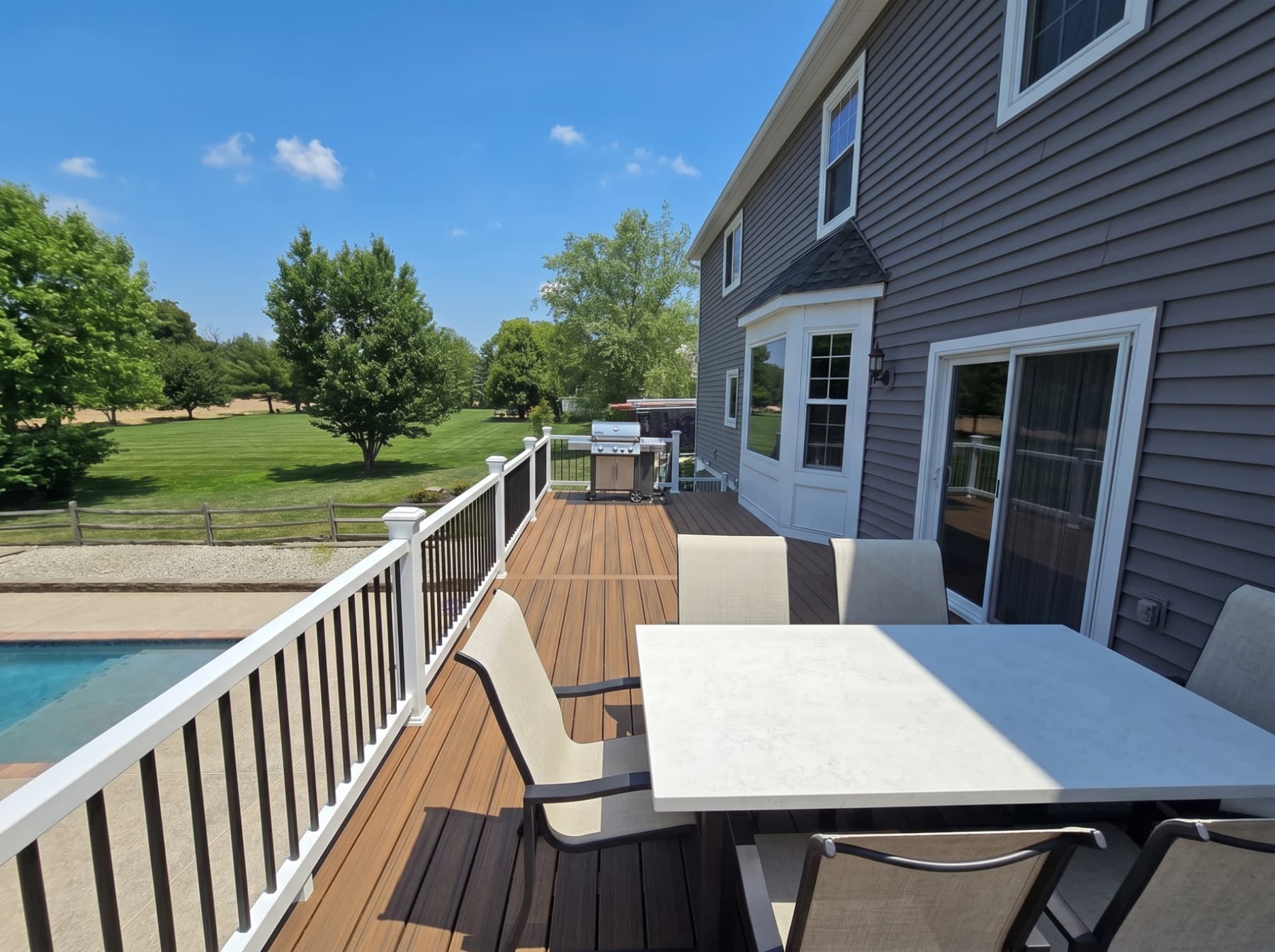 Poolside deck dining area in Doylestown