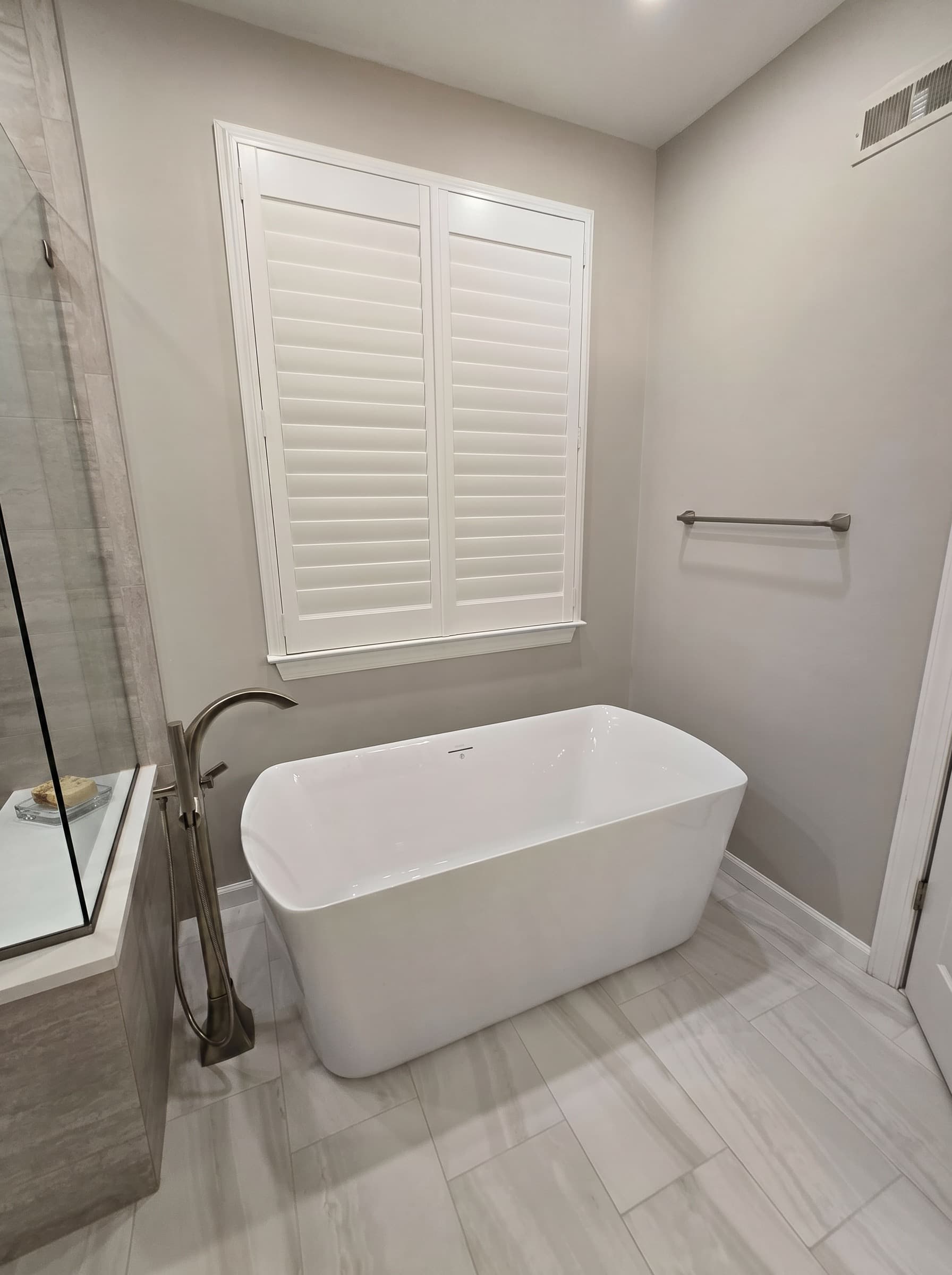 Freestanding soaking tub in a New Hope bathroom