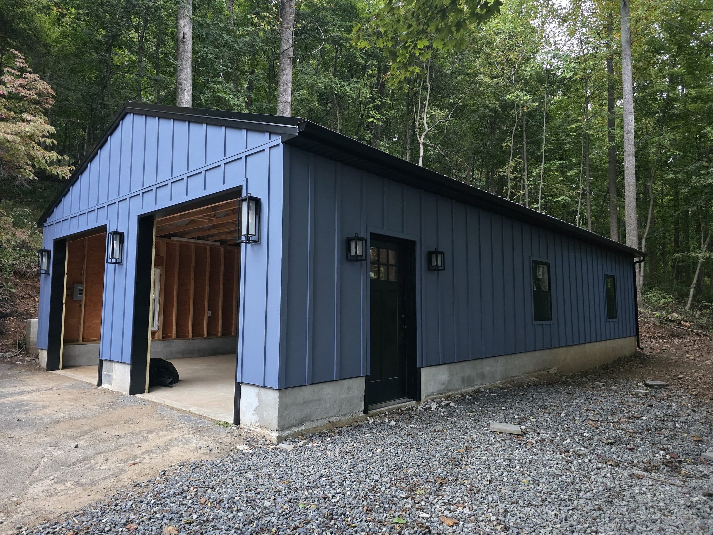 Detached Garage with Blue Board-and-Batten Siding Garage builder and remodeler: new two-bay detached garage with blue board-and-batten siding in Perkiomenville, PA